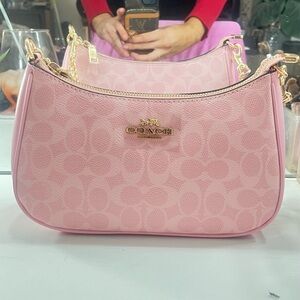 Small pink shoulder bag